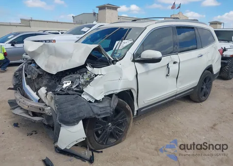 2019 Honda Pilot Touring z USA, uszkodzony, nr VIN 5FNYF6H95KB018182